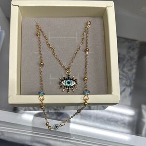 Gold Evil Eye Necklace with Blue Accents